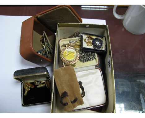 A Pair of Gent's Cufflinks, each square panel engine turned, on chain connections, indistinctly stamped "18K"; together with 