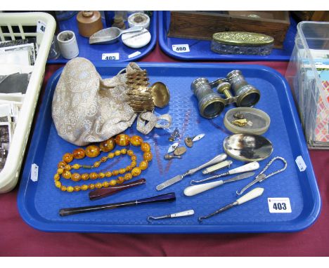 Opera Glasses, ladies evening bag, button hooks, bead necklace, cheroot holders, horn snuff box, etc:- One Tray