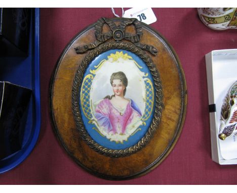 A Late XIX Century French Sévres Style Porcelain Plaque, of oval form, painted with a portrait of a Noblewoman, with blue cel