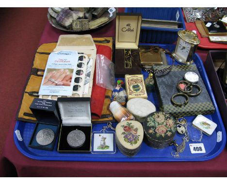 A Mantel Style Bedside Clock, trinket pots, Colibri lighter, commemorative coins, jewellery rolls, tortoiseshell effect head 