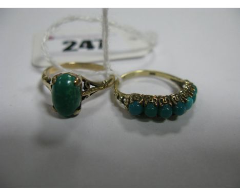 A 9ct Gold Seven Stone Turquoise Set Ring; together with a single stone ring. (2)