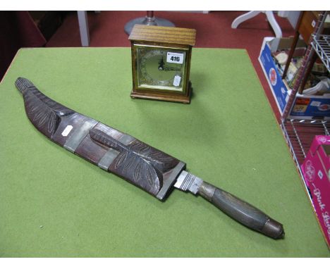 Elliott Mahogany Cased Mantel Clock, for Frederick Thorn of Coventry. A Bushmans knife with carved scabbard.