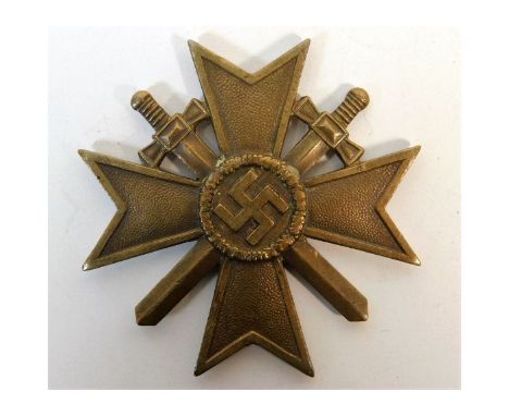 A WW2 Nazi Germany Third Reich Merit Cross with Swords. Provenance: Submitted by Mrs. Lauraine Sadleir MBE &amp; the late Mr.
