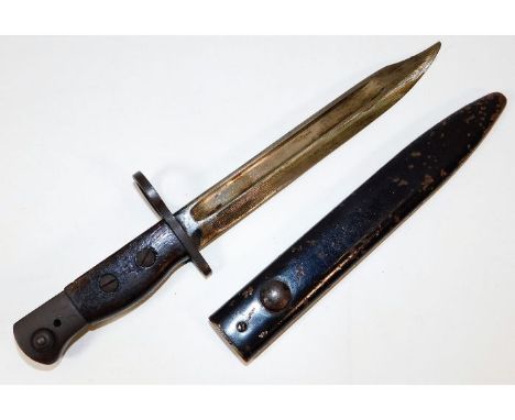 A British Lee-Enfield No.5 bayonet with scabbard. Provenance: Submitted by Mrs. Lauraine Sadleir MBE &amp; the late Mr. Micha