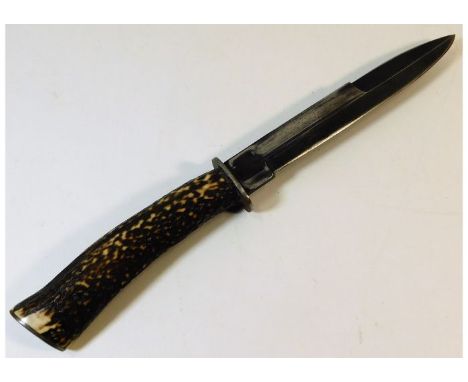 A WW1 German stag horn handled trench knife. Provenance: Submitted by Mrs. Lauraine Sadleir MBE &amp; the late Mr. Michael R.