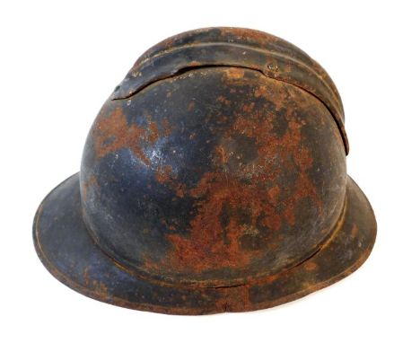 A WW2 french steel helmet. Provenance: Submitted by Mrs. Lauraine Sadleir MBE &amp; the late Mr. Michael R. Sadleir