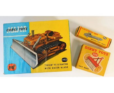 Three empty vintage diecast toy vehicle boxes: Tractor with dozer 1102, Bedford flat truck 066 &amp; Dinky hay rake 324 