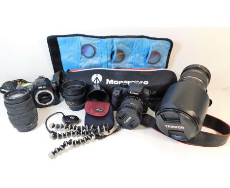 A quantity of photography equipment including a Tamron 150-600mm lens, Nikon DX 35mm lens, Sigma DC 55-200mm lens, Nikon D50 