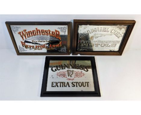 Two framed gun mirrors, Colt &amp; Winchester twinned with a Guinness. Provenance: Submitted by Mrs. Lauraine Sadleir MBE &am