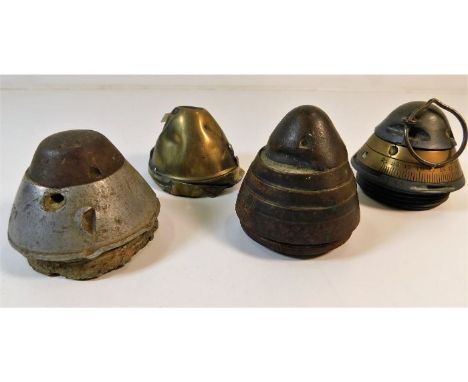 Four military shell fuses. Provenance: Submitted by Mrs. Lauraine Sadleir MBE &amp; the late Mr. Michael R. Sadleir