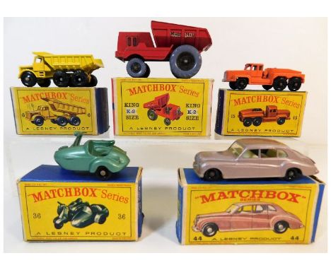 Five boxed Matchbox diecast toy vehicles: Quarry truck no. 6, Motor scooter &amp; sidecar no. 36, Pink Rolls Royce Phantom 5 