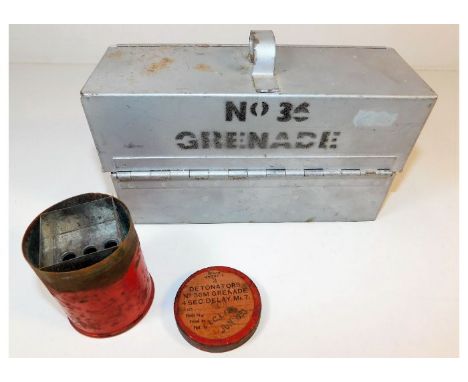 A WW2 no.3 grenade case twinned with a grenade fuse container. Provenance: Submitted by Mrs. Lauraine Sadleir MBE &amp; the l