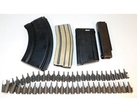 Four gun magazines: .303 Bren gun; .556 Colt Armalite M16; .45 Thompson SMG stick; 7.62 SLR &amp; an ammo belt. Provenance: S