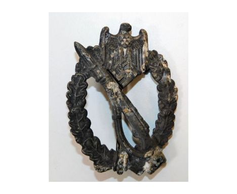 A WW2 Nazi Germany Third Reich Infantry Assault badge. Provenance: Submitted by Mrs. Lauraine Sadleir MBE &amp; the late Mr. 