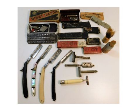 A quantity of mixed shaving related equipment including a hallmarked silver safety razor &amp; cut throats. Provenance: Submi