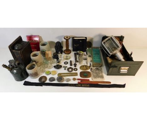 A quantity of mixed sundry items including a carriage lamp, a bust of Winston Churchill, a fragment of a Messerschmidt 109 en