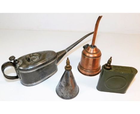 A W.D military gun oil can for a Vickers .303 machine gun twinned with three other gun oil cans. Provenance: Submitted by Mrs