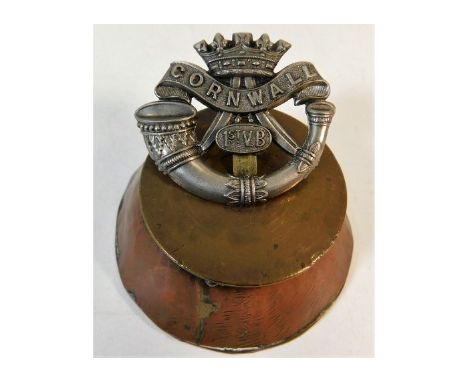 A DCLI 1st VB trench art badge stand. Provenance: Submitted by Mrs. Lauraine Sadleir MBE &amp; the late Mr. Michael R. Sadlei