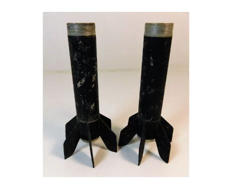Two spent shell casings. Provenance: Submitted by Mrs. Lauraine Sadleir MBE &amp; the late Mr. Michael R. Sadleir