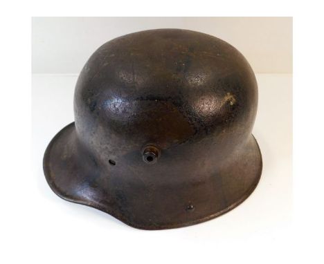A WW1 M16 German helmet. Provenance: Submitted by Mrs. Lauraine Sadleir MBE &amp; the late Mr. Michael R. Sadleir 