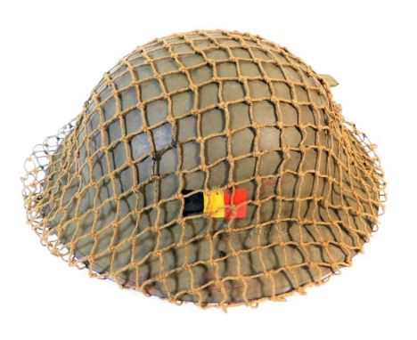 A WW2 Belgian flagged British patterned steel Brodie helmet &amp; net. Provenance: Submitted by Mrs. Lauraine Sadleir MBE &am