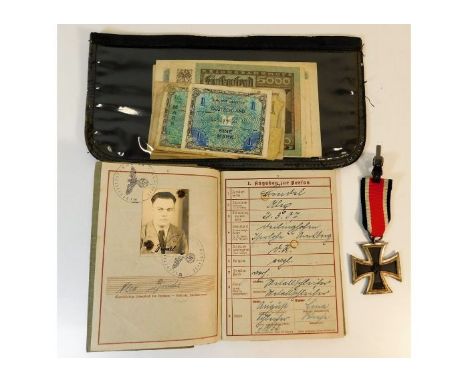 A WW2 Nazi Germany Third Reich Wehrpass in the name of Bintel, recovered from the occupation of the Channel Islands, a WW2 ir