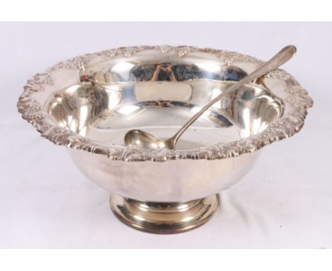 Silver plated punch bowl with vineous border, 44cm dia with a ladle (2)