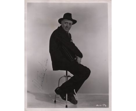 SIM ALASTAIR: (1900-1976) Scottish Character Actor. An excellent vintage signed 8 x 10 photograph of Sim seated in a full len