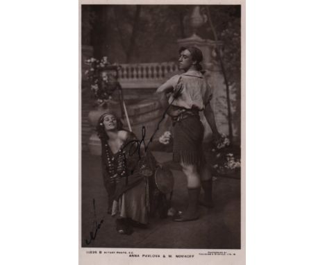  PAVLOVA ANNA: (1881-1931) Russian Ballet Dancer. Vintage signed postcard photograph of Pavlova in a full length pose, in gyp