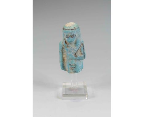 Egyptian Faience ShabtiThird Intermediate Period, Circa 900 BC.The figure is depicted in mummiform position showing agricultu
