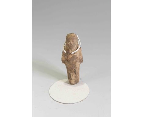Egyptian Faience ShabtiThird Intermediate Period, Circa 900 BC.The figure is depicted in mummiform position showing agricultu