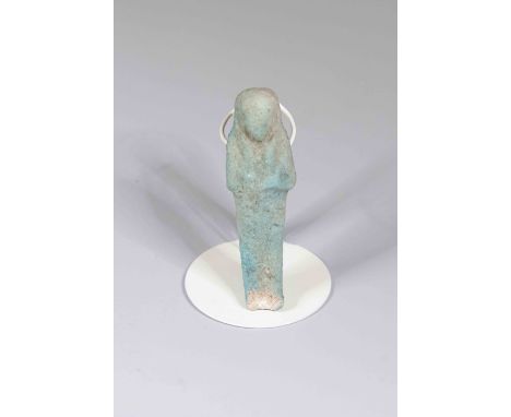 Egyptian Faience ShabtiPtolemaic Period, c. 300-32 B.C.Small, mummiform worker figure with faintly modelled detail: wears tri