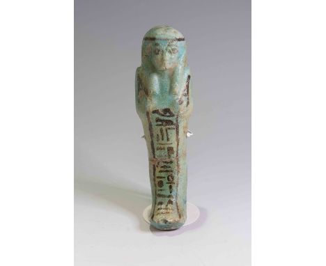 Egyptian Faience Shabti for Nes-Ankh-ef-en-Maat22nd Dynasty, 945 - 715 B.C.Mould-made worker shabti with detail added in blac