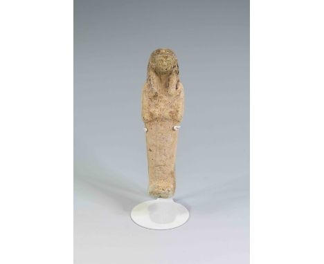 Egyptian Faience ShabtiNew Kingdom, 18th - 20th Dynasty, 1550 - 1085 B.C.A green figure in mummiform pose, holding agricultur