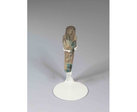 Egyptian Faience ShabtiLate Period, c. 525 B.C.A small mould-made mummiform worker figure wearing a tripartite wig, arms cros