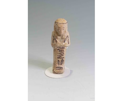 Egyptian Faience ShabtiThird Intermediate Period, Circa 900 BC.The figure is depicted in mummiform position showing agricultu