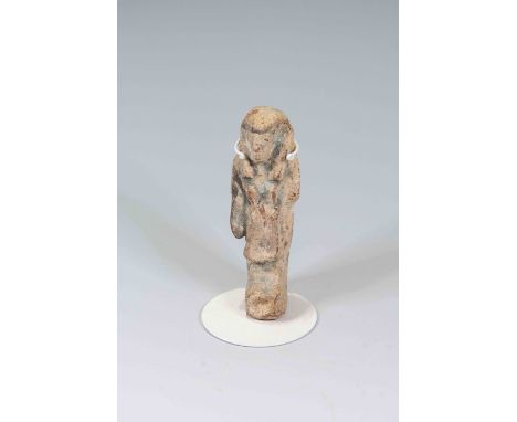 Egyptian Faience ShabtiThird Intermediate Period, Circa 900 BC.The figure is depicted in mummiform position showing agricultu
