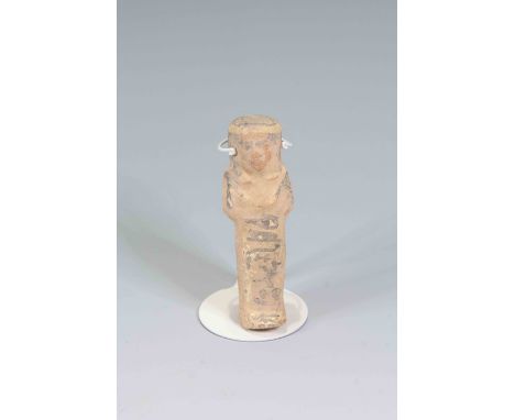 Egyptian Faience ShabtiThird Intermediate Period, Circa 900 BC.The figure is depicted in mummiform position showing agricultu