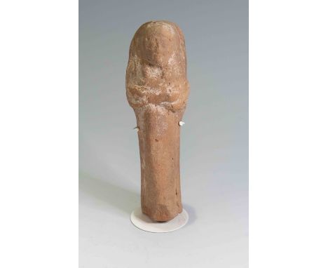 Egyptian Terracotta ShabtiNew Kingdom, C. 1550 – 1070 B.C.  A moulded terracotta shabti figure with long body and clear detai