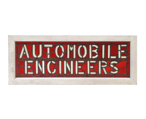 An 'Automobile Engineers' stained-glass sign, c.1900, with a ruby glass leaded panel, mounted in a plain wood frame,25 x 76cm