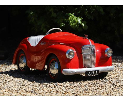 A 1950s Austin J40 pedal car Registration Number: JJH1Chassis Number: JR3881 (July 1950)Mileage. 01948Finished in tartan red,
