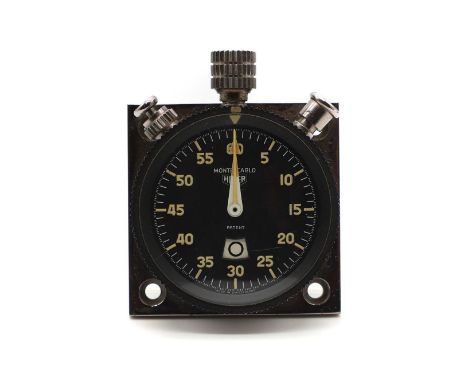 A Heuer 'Monte Carlo' dashboard stopwatch/lap timer, c.1970, with a manual-wind Swiss movement, the black dial with luminous 