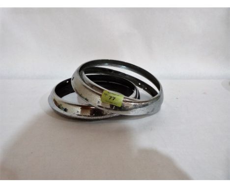 Four headlamp bezels