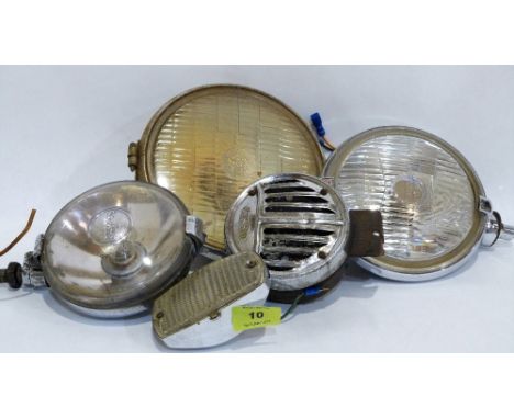 Two Lucas spotlights; a Rootes spotlight; a Lissen horn and a reversing lamp
