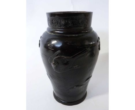 A Japanese bronze vase Meiji period with applied decorations of birds in branches, seal mark to base, 26cm high