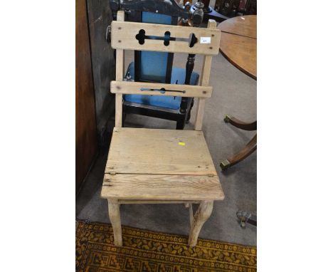 A Victorian light oak metamorphic library steps/chair with pierced decoration to the back, 85cm high