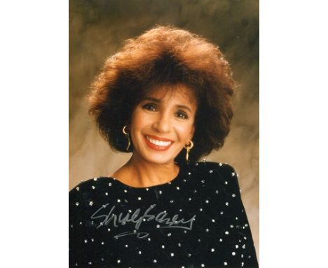 SHIRLEY BASSEY, 7x5 inch photo signed by legendary welsh singer, Shirley Bassey who sang the Bond theme for Goldfinger. Good 
