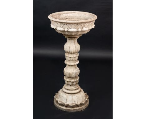 Marble Basin in Renaissance manner , sculpted with leaves and fruits , round base with thickened curved central column, round
