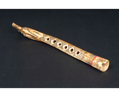 Ethnological pipe, with engravings bone, probably south America. 30 cm long
