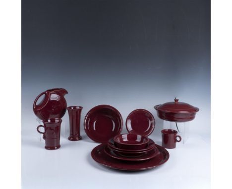 A varied pottery set consisting of an extra large serving platter (15"W x 1.25"H), a casserole bowl (10.75"W x 3"H) with lid 